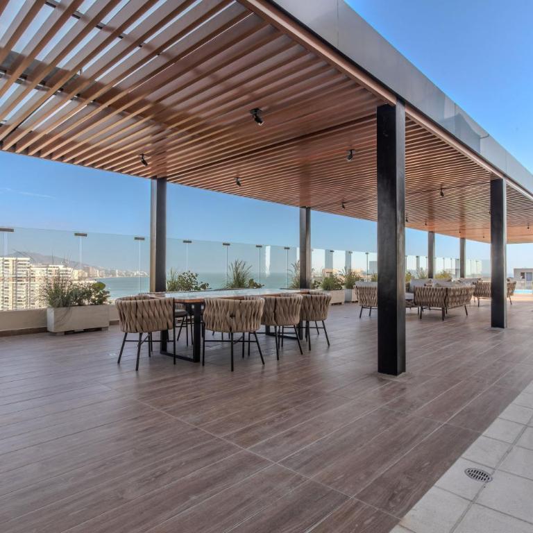 Amplia Suite Moderna con balcón cerca al mar - One-Bedroom Apartment - 23