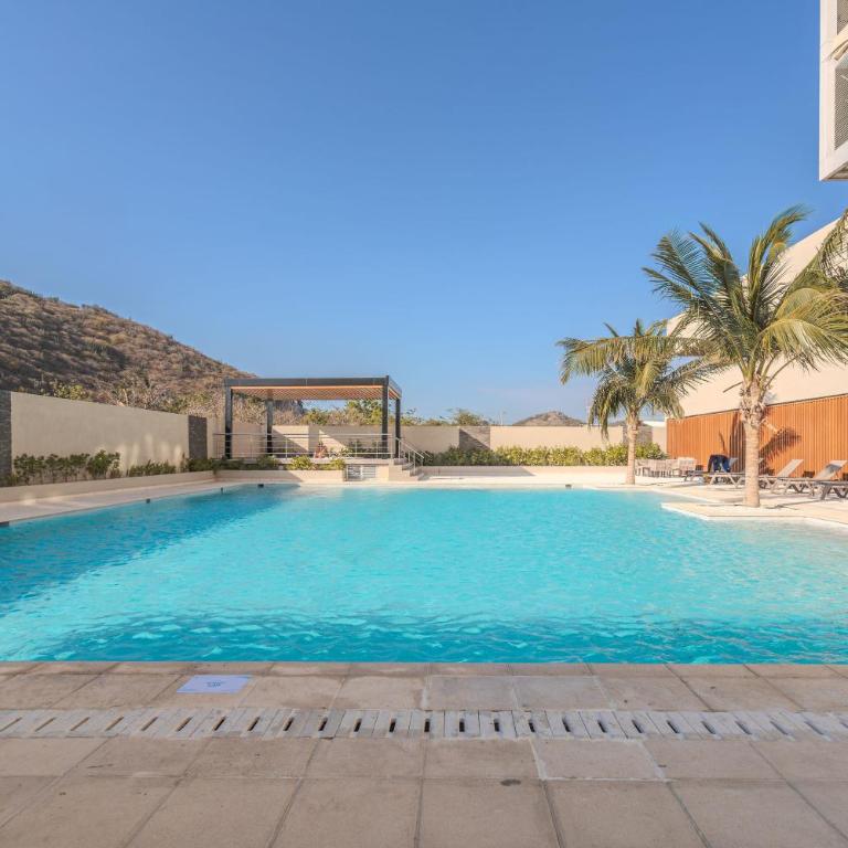 Amplia Suite Moderna con balcón cerca al mar - One-Bedroom Apartment - 16