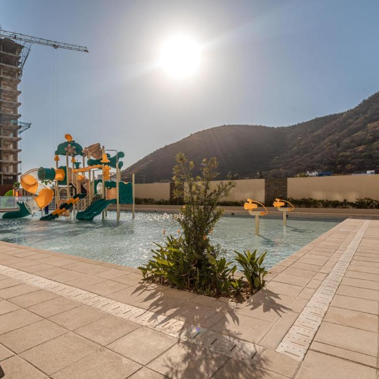 Amplia Suite Moderna con balcón cerca al mar - One-Bedroom Apartment - 33