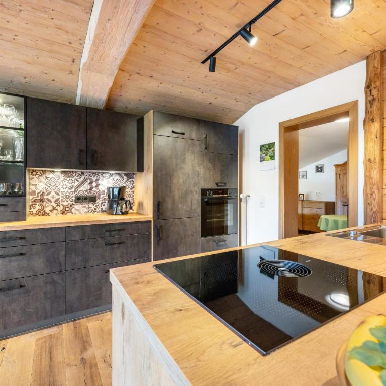 Ferienwohnung Steinbacher - Deluxe-Apartment mit 2 Schlafzimmern und Gartenblick - 12