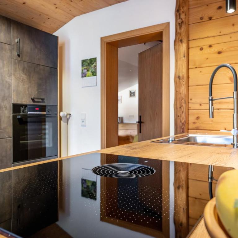 Ferienwohnung Steinbacher - Deluxe-Apartment mit 2 Schlafzimmern und Gartenblick - 16