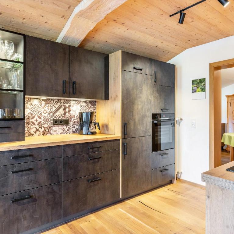 Ferienwohnung Steinbacher - Deluxe-Apartment mit 2 Schlafzimmern und Gartenblick - 14