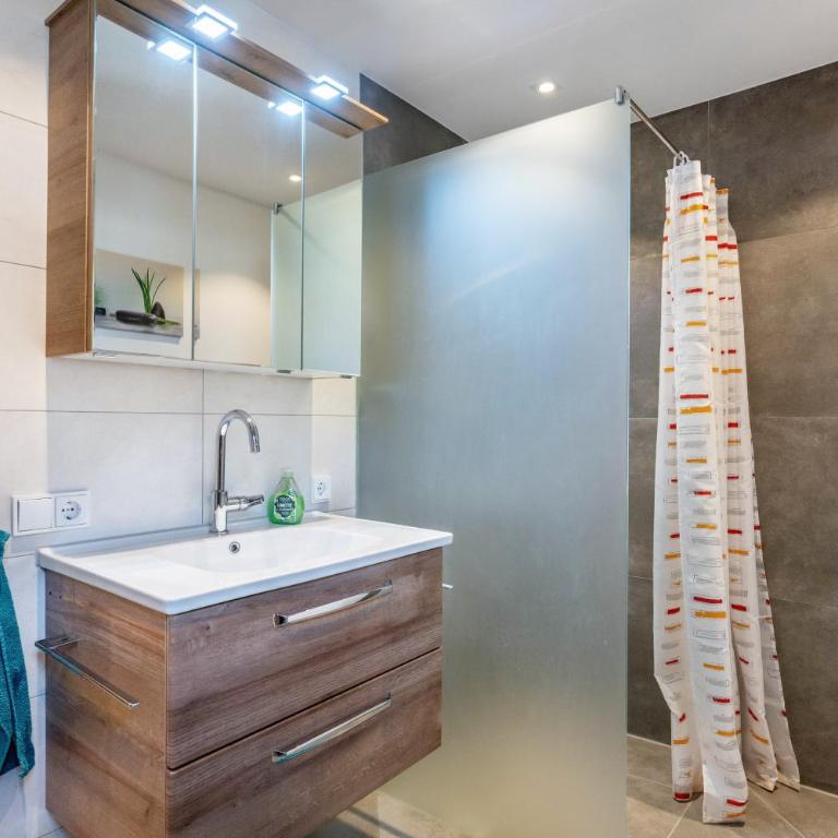 Ferienwohnung Steinbacher - Deluxe-Apartment mit 2 Schlafzimmern und Gartenblick - 23