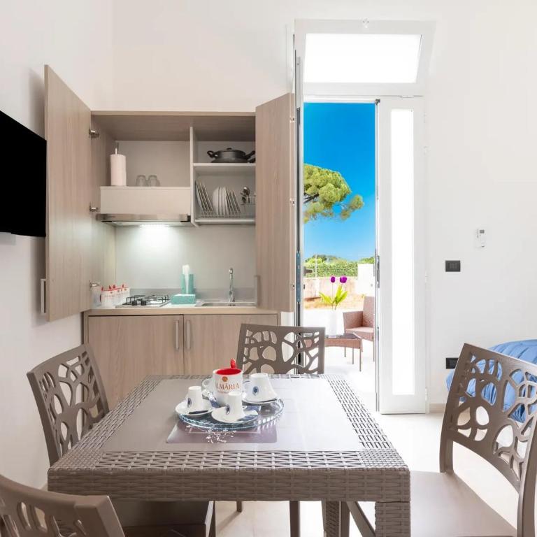 Monolocale Vela Nuovo con Wi-Fi, Clima e Giardino a Torre Lapillo - Vacation Home - 1