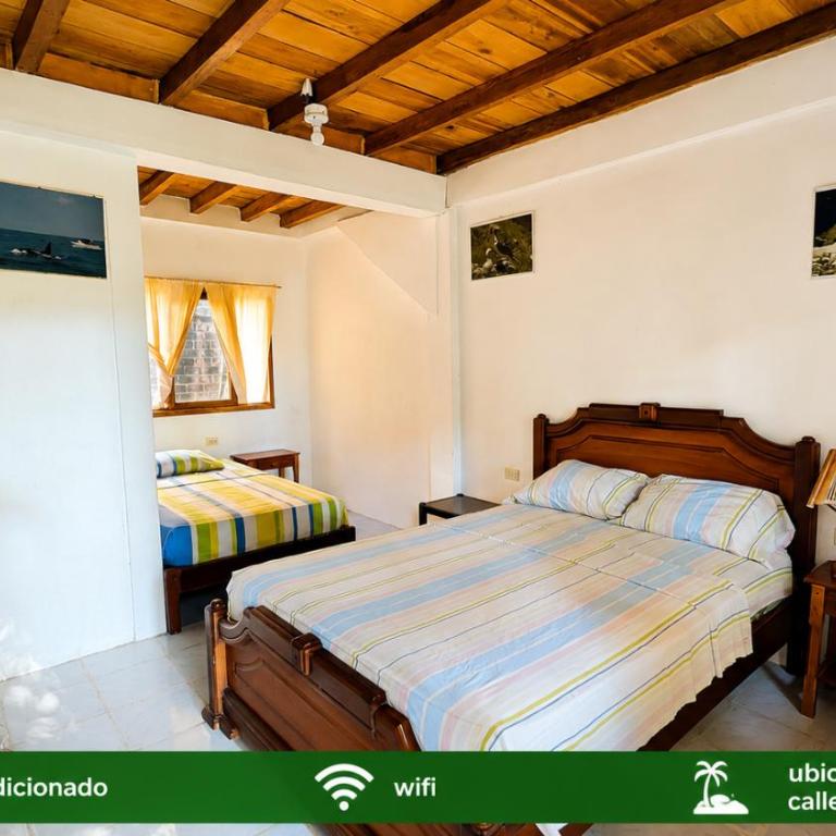 Suites Villa Colombia - Habitación Triple con vistas al jardín - 1