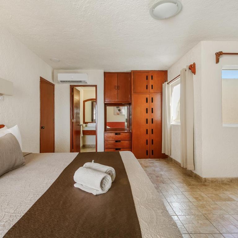 Luciana Hotel & Beach Club - Habitación con cama extragrande. - 9