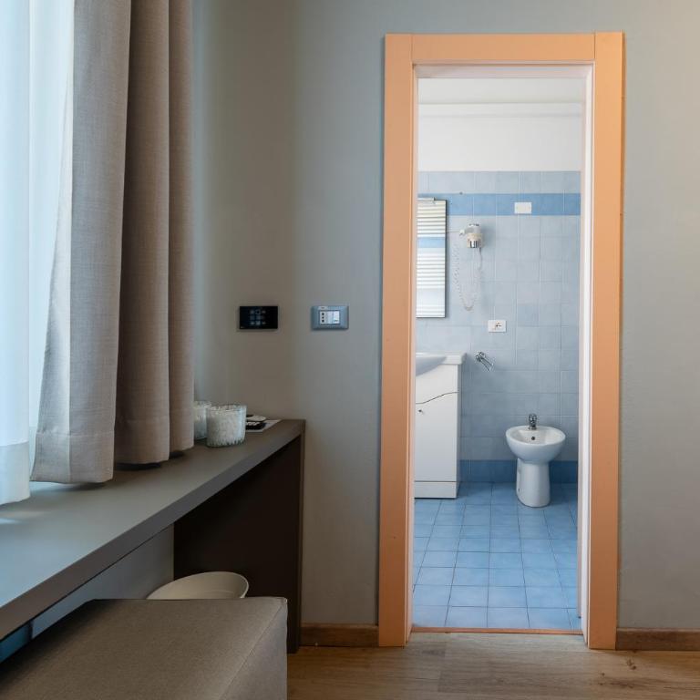 Hotel Central Giacomini - Camera Deluxe (2 Adulti + 1 Bambino) - 16