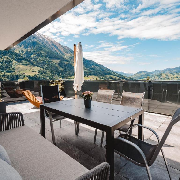 Gern Mountain Living Ferienhaus Deutschmann - Apartment mit Terrasse - 1