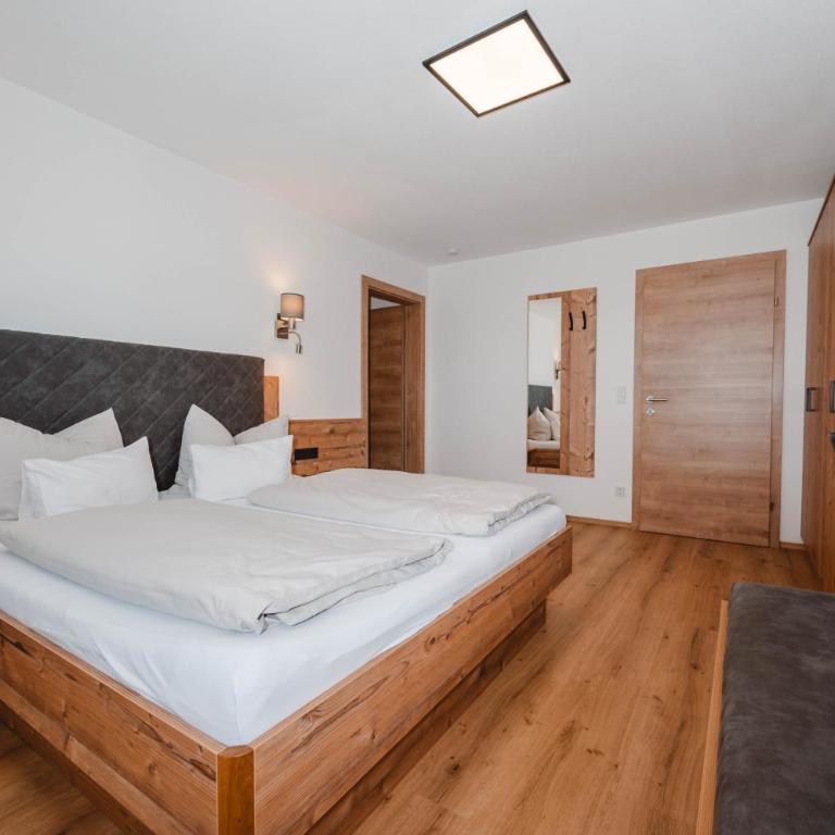Gern Mountain Living Ferienhaus Deutschmann - Apartment mit Terrasse - 7