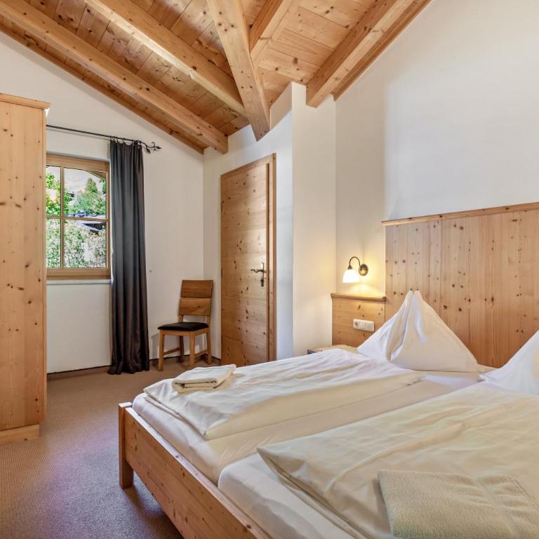 Appartements Stockinger B3 - Deluxe-Apartment mit 2 Schlafzimmern und Gartenblick - 25