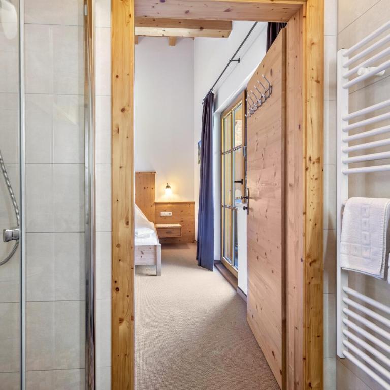 Appartements Stockinger B3 - Deluxe-Apartment mit 2 Schlafzimmern und Gartenblick - 24