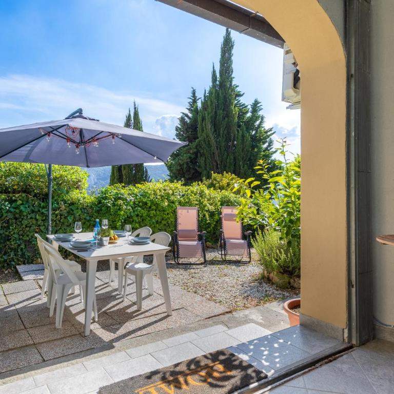 Hostdomus - Il Giardinetto-posto auto gratuito - Appartamento con 1 Camera da Letto - 1