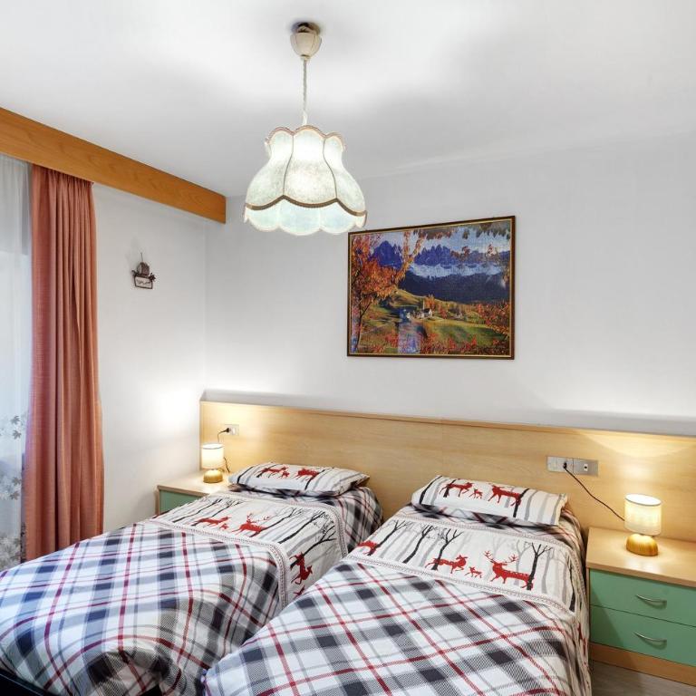 Appartamenti Lella - Appartamento Deluxe con 2 Camere da Letto e Vista Giardino - 13