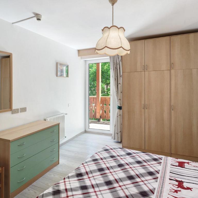 Appartamenti Lella - Appartamento Deluxe con 2 Camere da Letto e Vista Giardino - 8