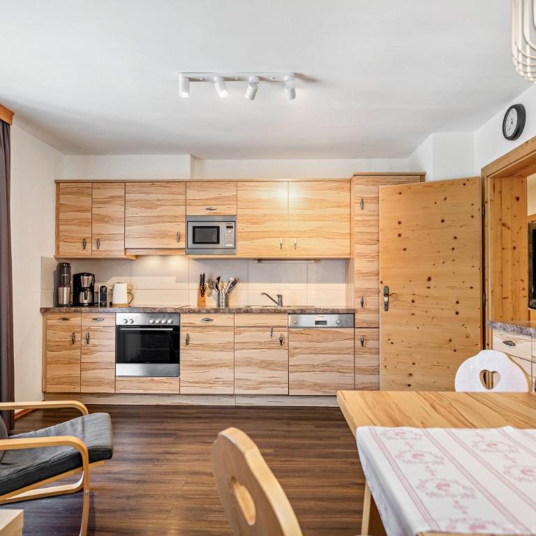 Appartements Stockinger B4 - Apartamento Deluxe de 2 dormitorios con vistas al jardín - 10