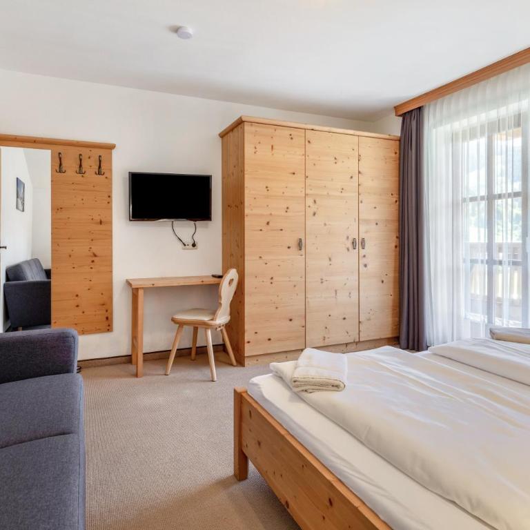 Appartements Stockinger B4 - Apartamento Deluxe de 2 dormitorios con vistas al jardín - 15