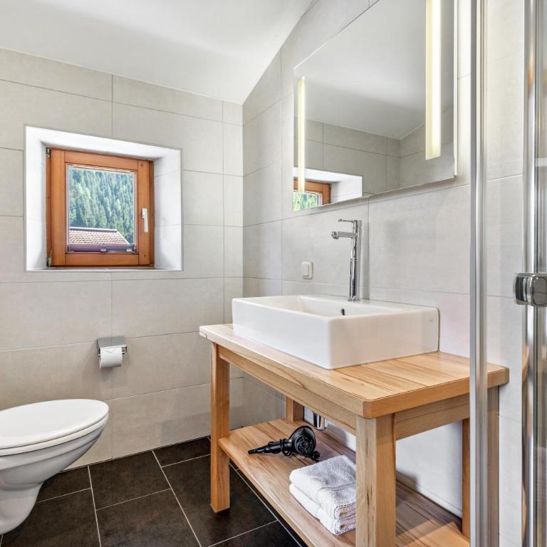 Appartements Stockinger B4 - Apartamento Deluxe de 2 dormitorios con vistas al jardín - 27