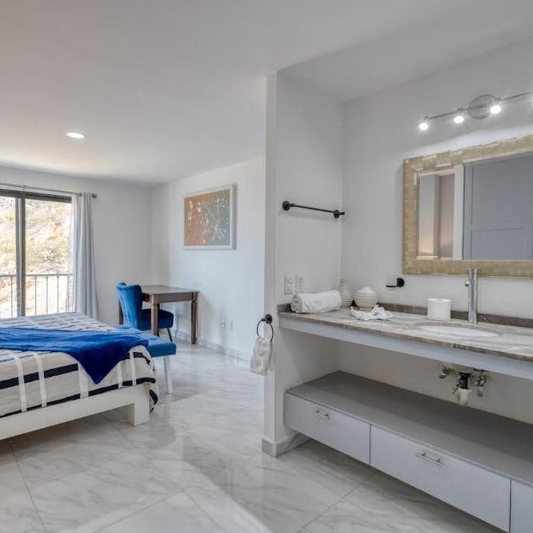 Dog-friendly hotel suite with ocean-view rooftop infinity pool, central AC & gym - Casa - 13