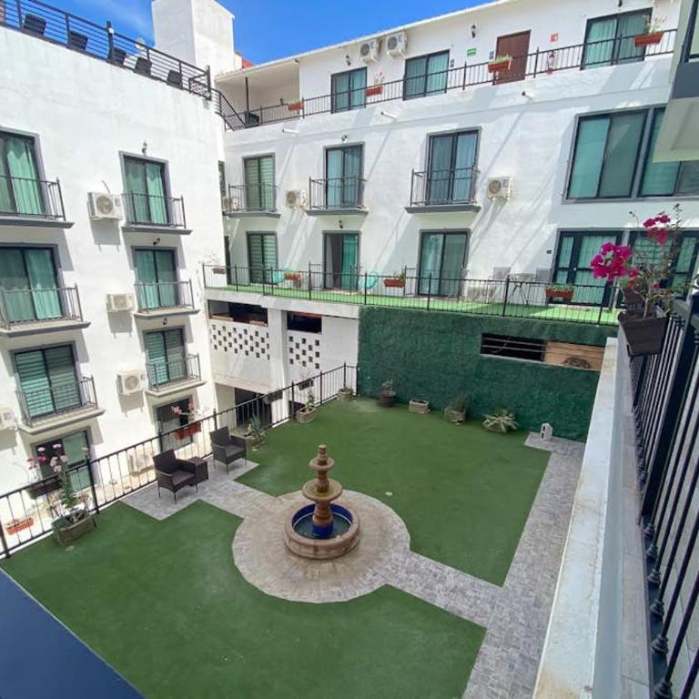 Dog-friendly hotel suite with ocean-view rooftop infinity pool, central AC & gym - Casa - 18