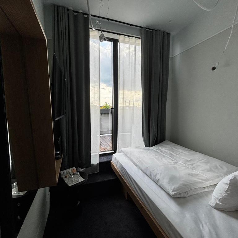 ALPAMI Boutique Glockenbach - Einzelzimmer mit Terrasse - 2