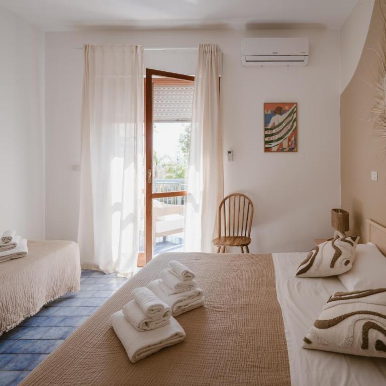 Nido Colorato B&B - Camera Tripla Deluxe con Vista Mare - 5