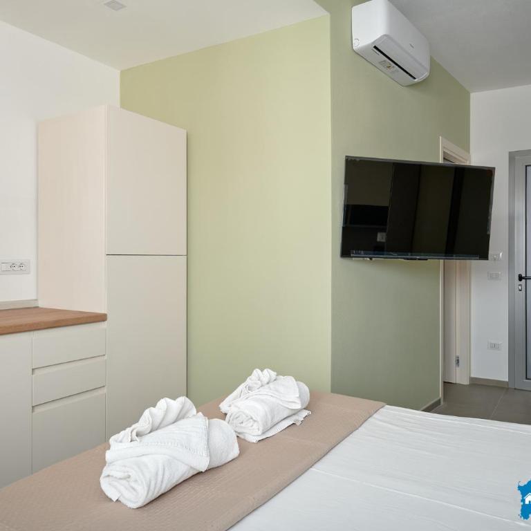 Appartamenti Mari Bà - 900m dalla spiaggia By BudoniAffitti - Vacation Home - 18