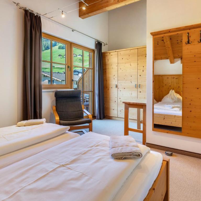 Appartements Stockinger A2 - Deluxe-Apartment mit 2 Schlafzimmern und Gartenblick - 14
