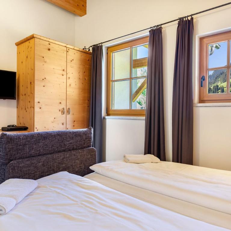 Appartements Stockinger A2 - Deluxe-Apartment mit 2 Schlafzimmern und Gartenblick - 20