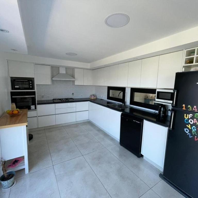Arenas del Sur pileta climatizada una planta - Three-Bedroom House - 5