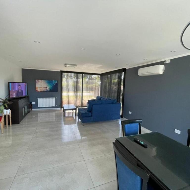 Arenas del Sur pileta climatizada una planta - Three-Bedroom House - 16