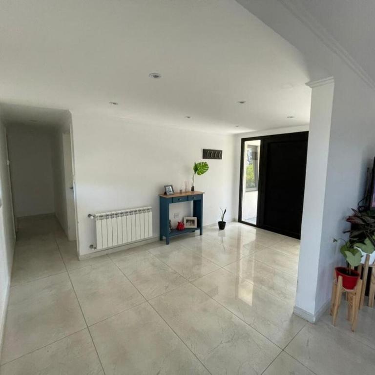 Arenas del Sur pileta climatizada una planta - Three-Bedroom House - 20