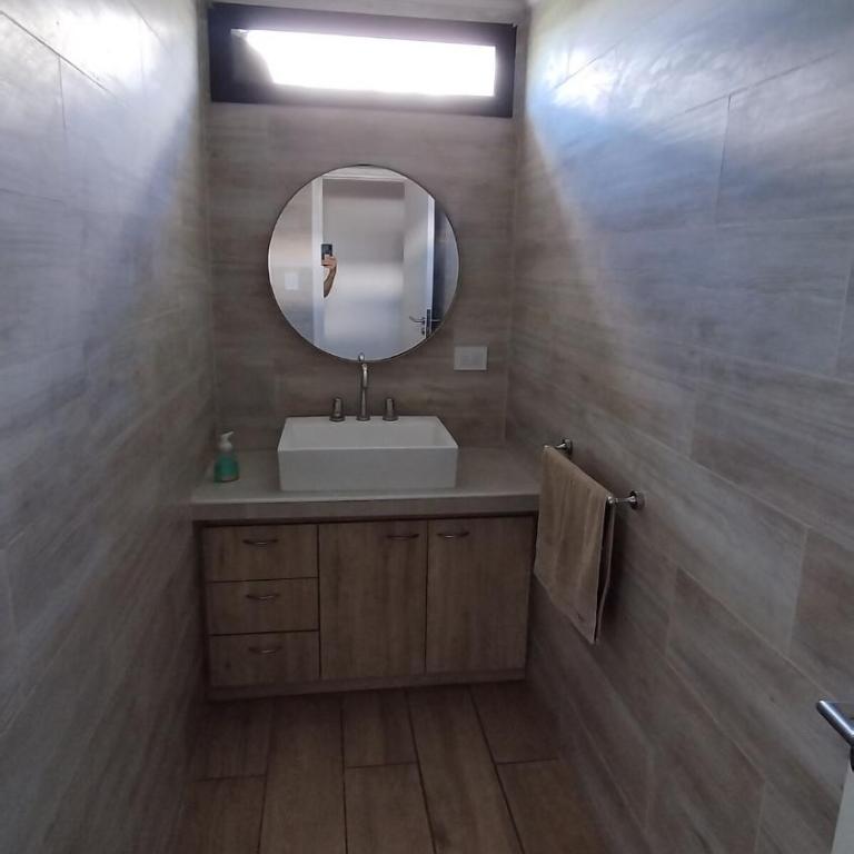 Arenas del Sur pileta climatizada una planta - Three-Bedroom House - 21