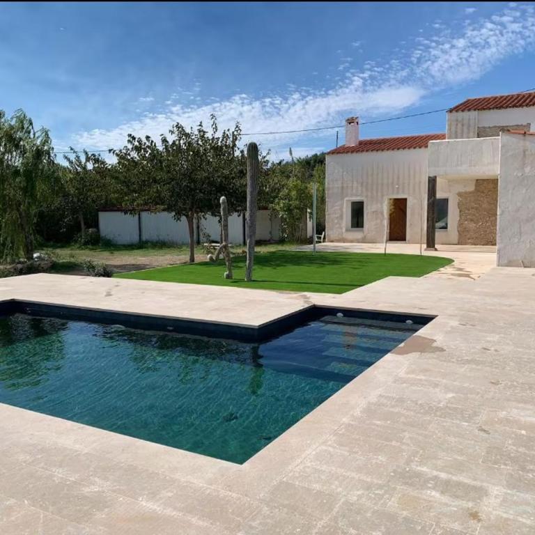 Mas Miralles, L'Ampolla, Delta del Ebre National Park, Piscina privada - Four-Bedroom Vacation Home - 6
