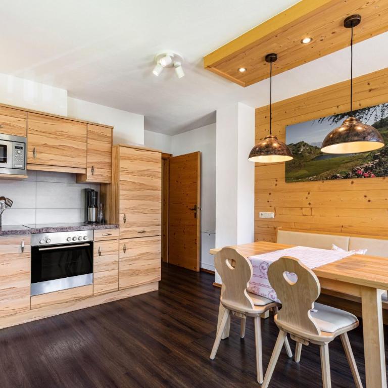 Appartements Stockinger A1 - Appartamento Deluxe con 2 Camere da Letto e Vista Giardino - 7