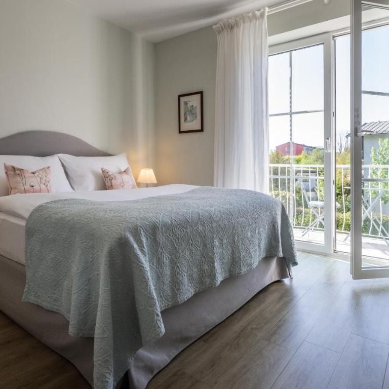 The Little Guesthouse - Kleines Doppelzimmer Cosy mit Balkon - 5