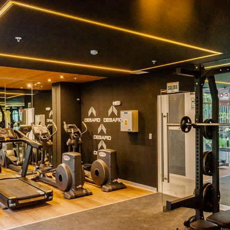 Stylish 2BR Retreat with Pool, Gym & Great Location - Apartment - 3
