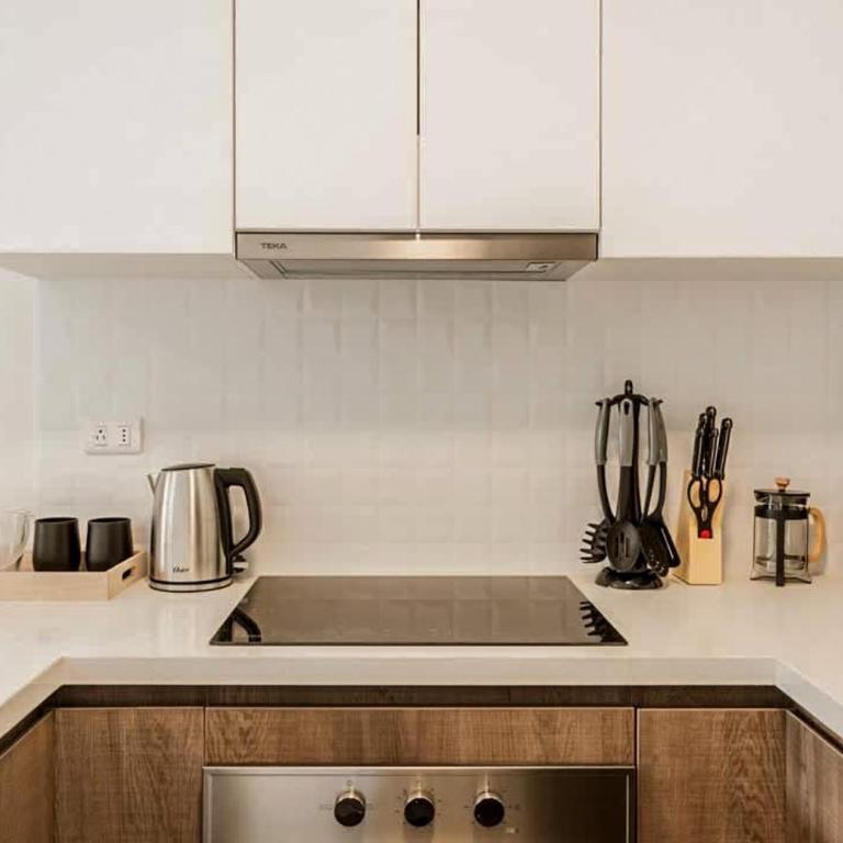 Stylish 2BR Retreat with Pool, Gym & Great Location - Apartment - 7