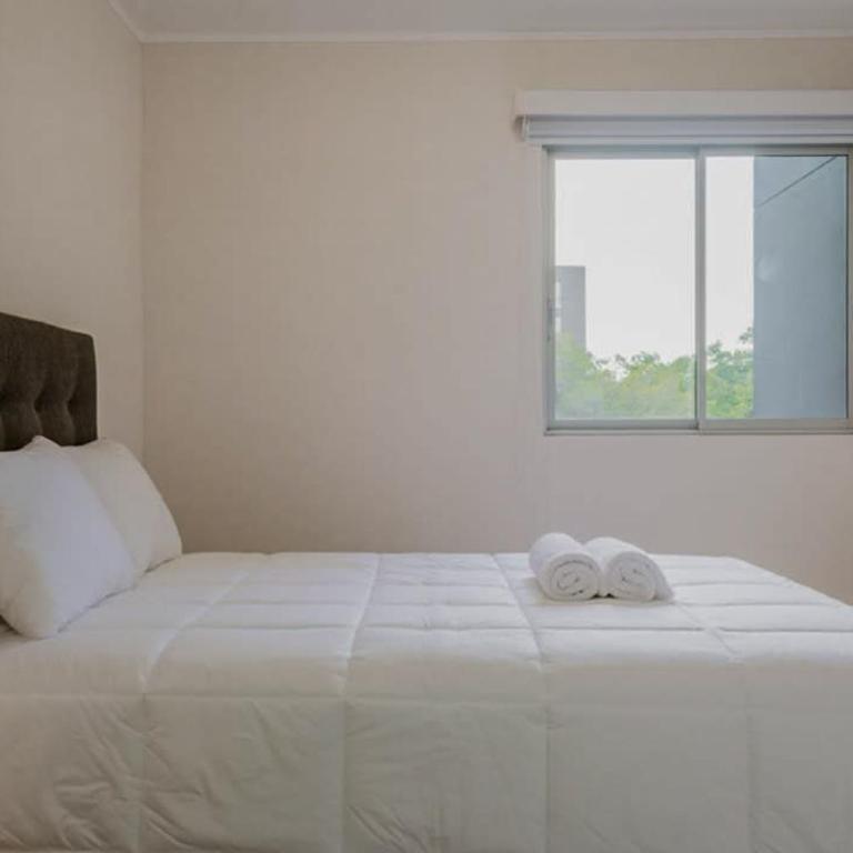 Stylish 2BR Retreat with Pool, Gym & Great Location - Apartment - 13