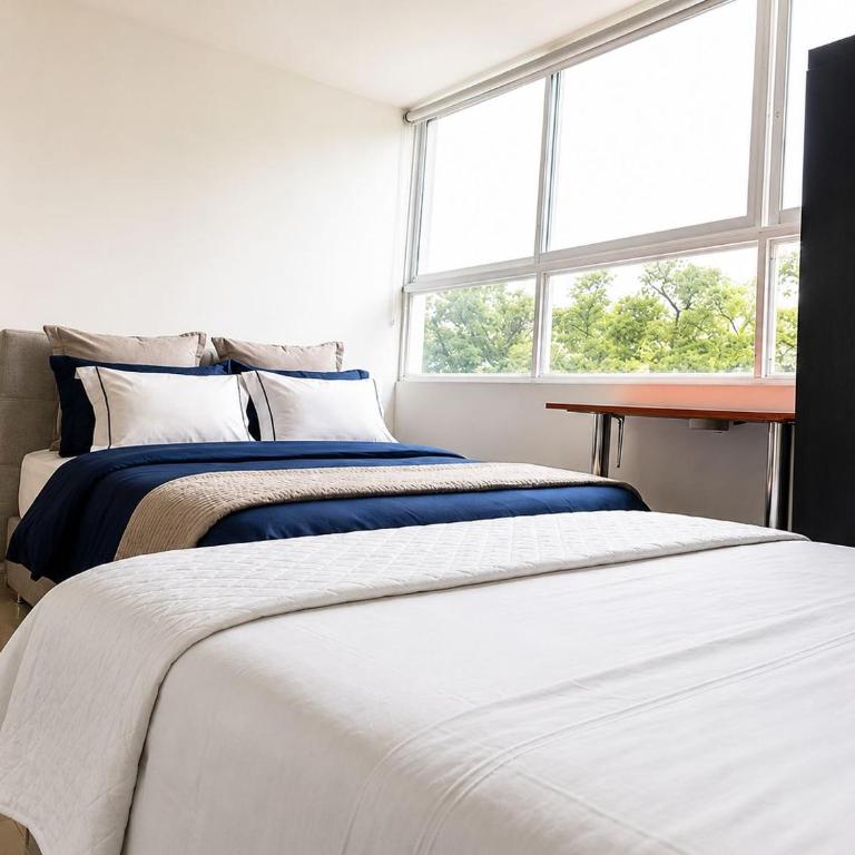 Apartamento de tres habitaciones y cuatro camas, cuenta con dos baños privados sala comedor y cocina totalmente equipada - Apartamento de 1 dormitorio - 6