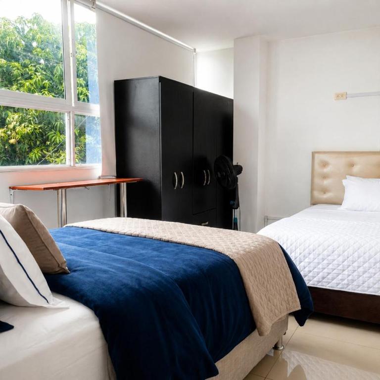 Apartamento de tres habitaciones y cuatro camas, cuenta con dos baños privados sala comedor y cocina totalmente equipada - Apartamento de 1 dormitorio - 7