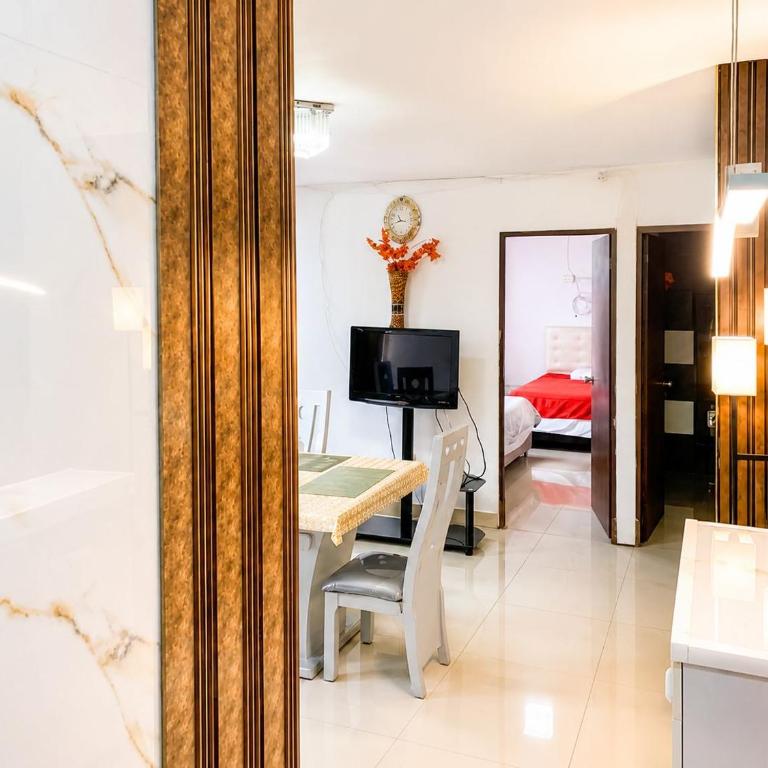Apartamento de tres habitaciones y cuatro camas, cuenta con dos baños privados sala comedor y cocina totalmente equipada - Apartamento de 1 dormitorio - 11