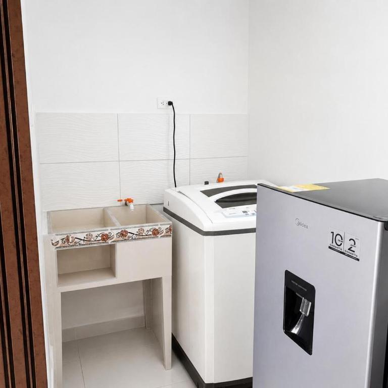 Apartamento de tres habitaciones y cuatro camas, cuenta con dos baños privados sala comedor y cocina totalmente equipada - Apartamento de 1 dormitorio - 12