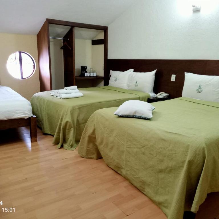 Casa Nucú Hotel - Standard Vierbettzimmer - 1