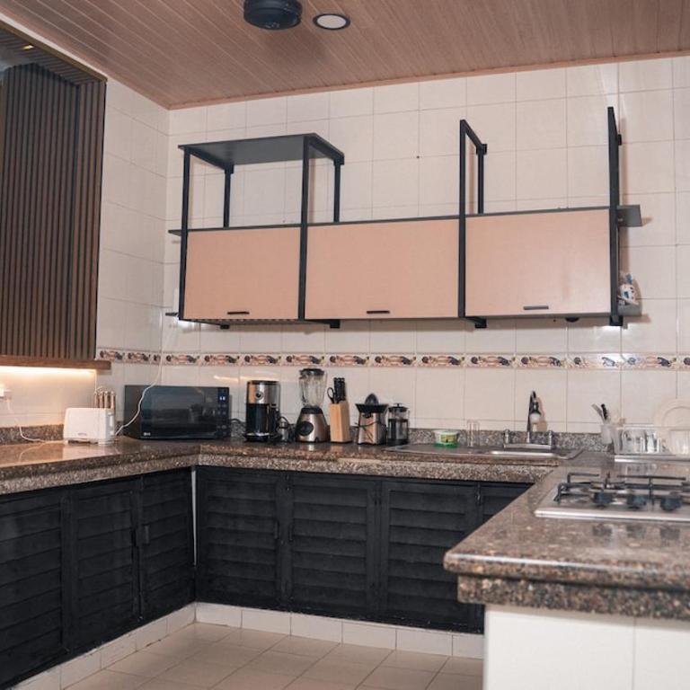 Close to Downtown Executive Suite in Manga with Jacuzzi - One-Bedroom Apartment - 1