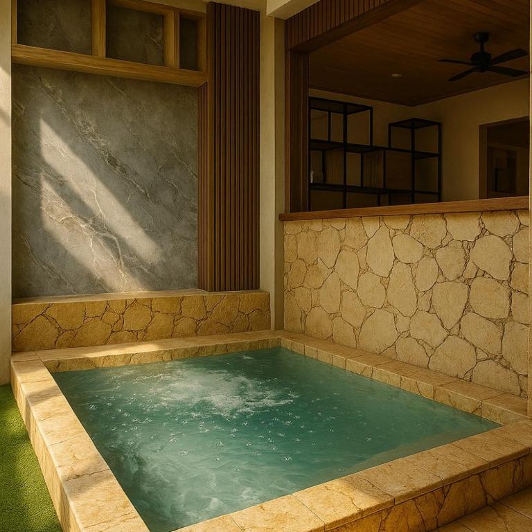 Close to Downtown Executive Suite in Manga with Jacuzzi - One-Bedroom Apartment - 4
