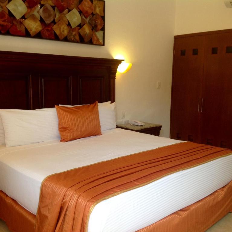 Hotel Las Golondrinas - Deluxe King Room - 11