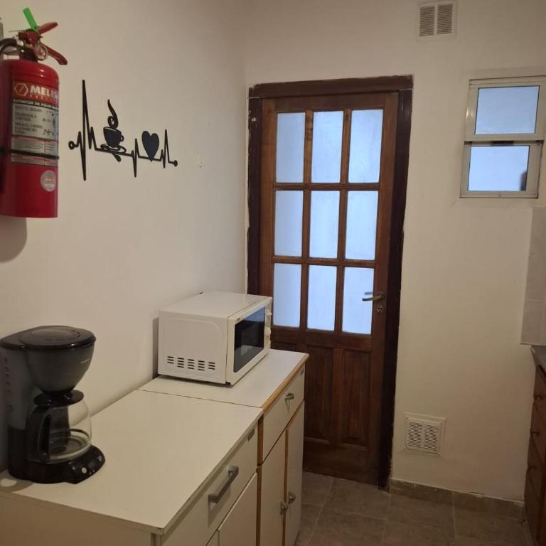 Departamento céntrico 19 de Mayo con cochera - Apartamento - 23
