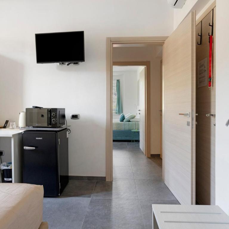 Domi Home - Appartamento Deluxe con 2 Camere da Letto e Vista Giardino - 1