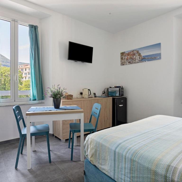 Domi Home - Appartamento Deluxe con 2 Camere da Letto e Vista Giardino - 8