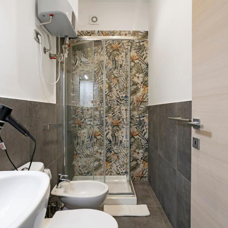 Domi Home - Appartamento Deluxe con 2 Camere da Letto e Vista Giardino - 15